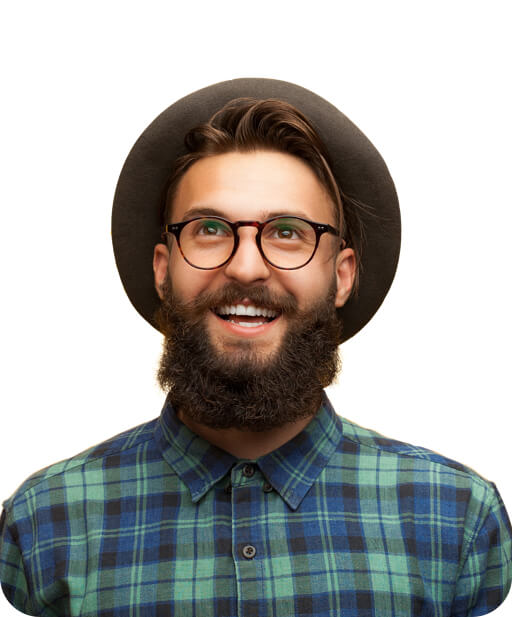 Man wearing glasses and hat looking in front and smiling