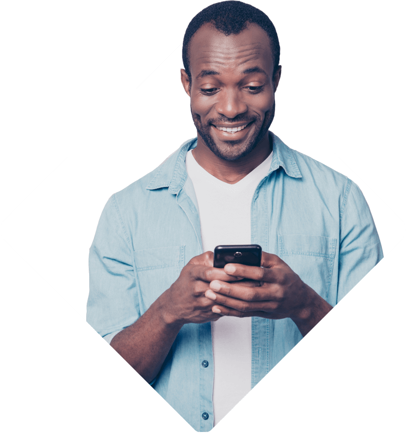 Man looking at his smartphone and smiling